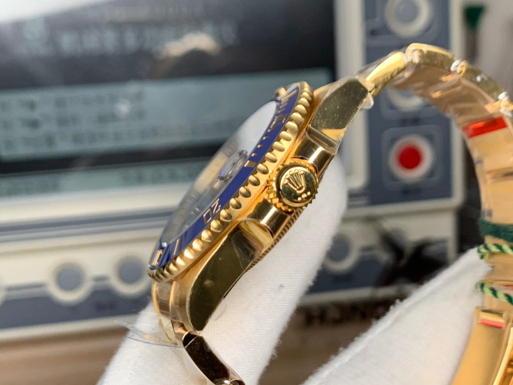 Rolex Submariner : Gold, Blue dial