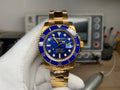 Rolex Submariner : Gold, Blue dial