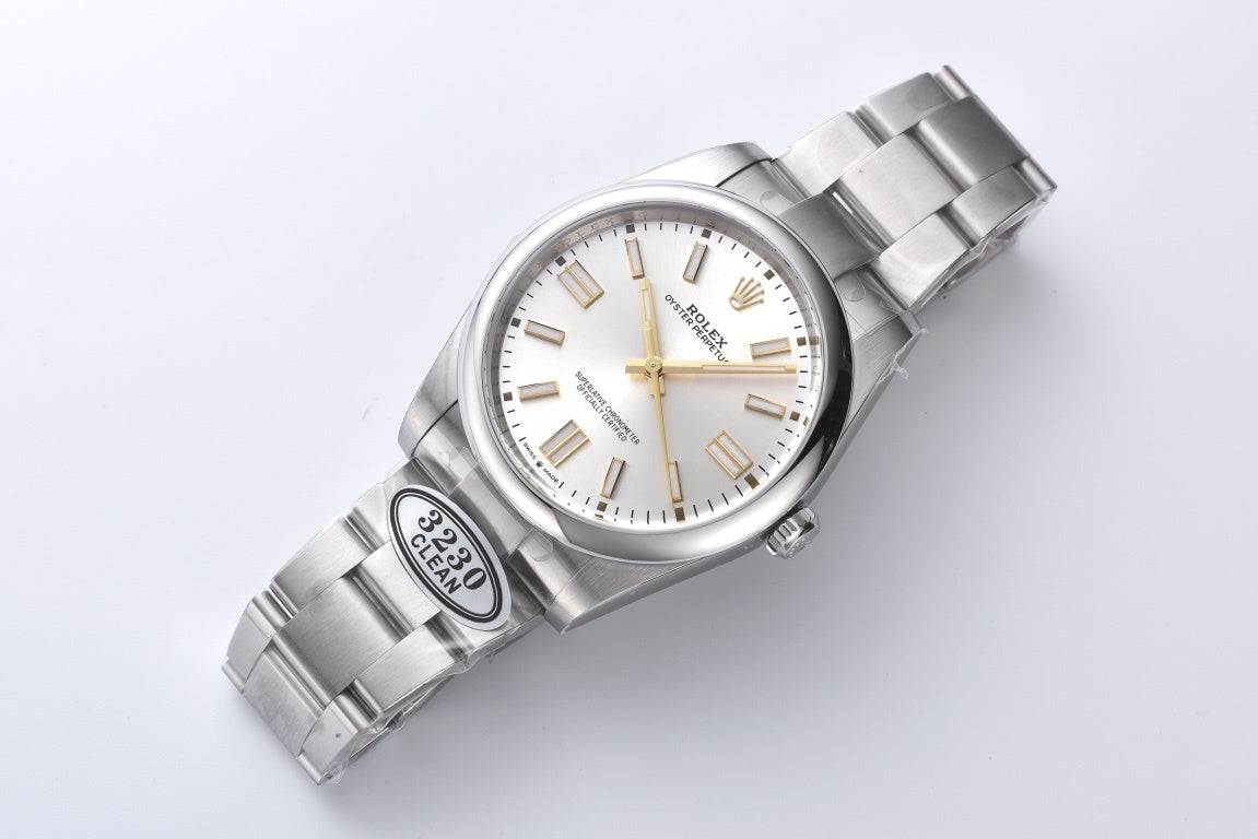 Rolex Oyster Perpetual 124300 : Silver Dial with Yellow Gold markers