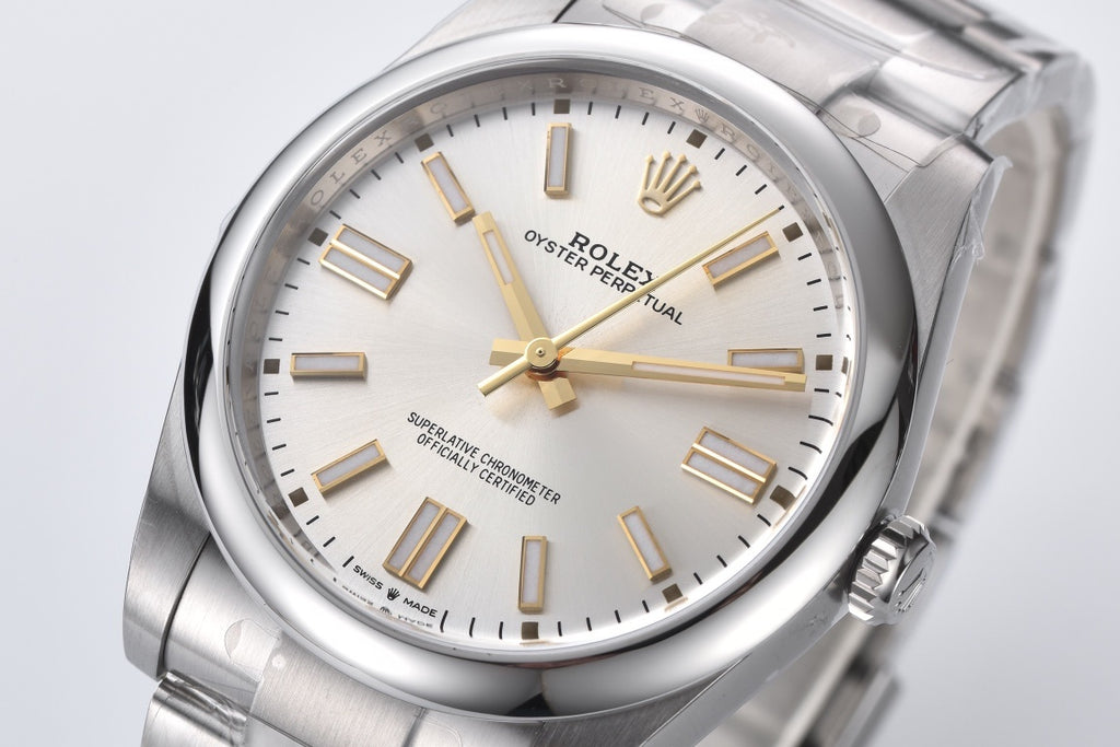 Rolex Oyster Perpetual 124300 : Silver Dial with Yellow Gold markers
