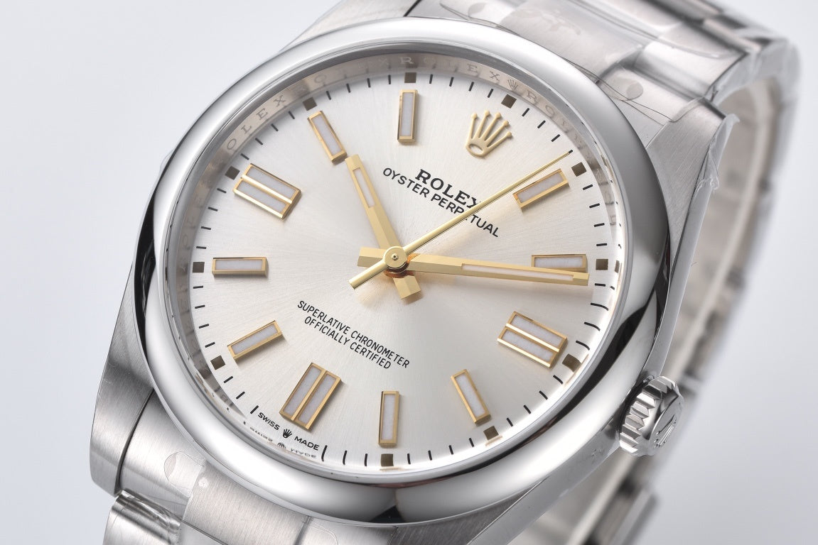 Rolex Oyster Perpetual 124300 : Silver Dial with Yellow Gold markers