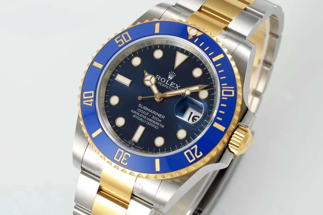 Rolex Submariner : Silver & gold , blue face, blue dial